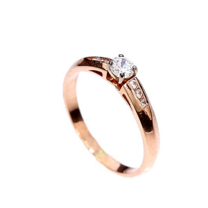 Golden ring with zircon