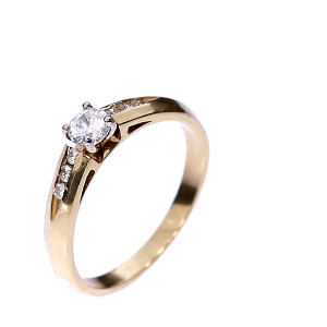 Golden ring with zircon