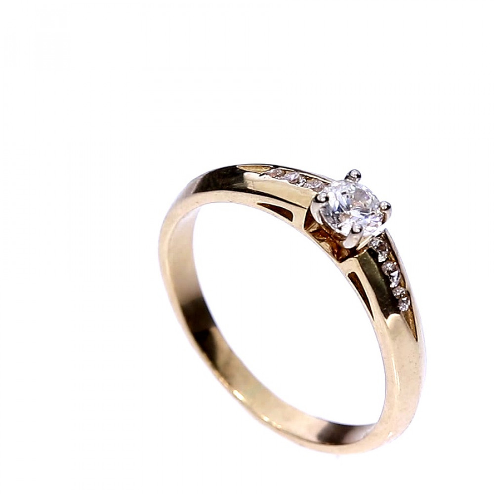 Golden ring with zircon