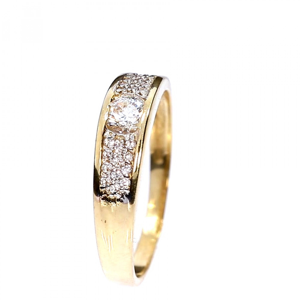 Golden ring with zircon