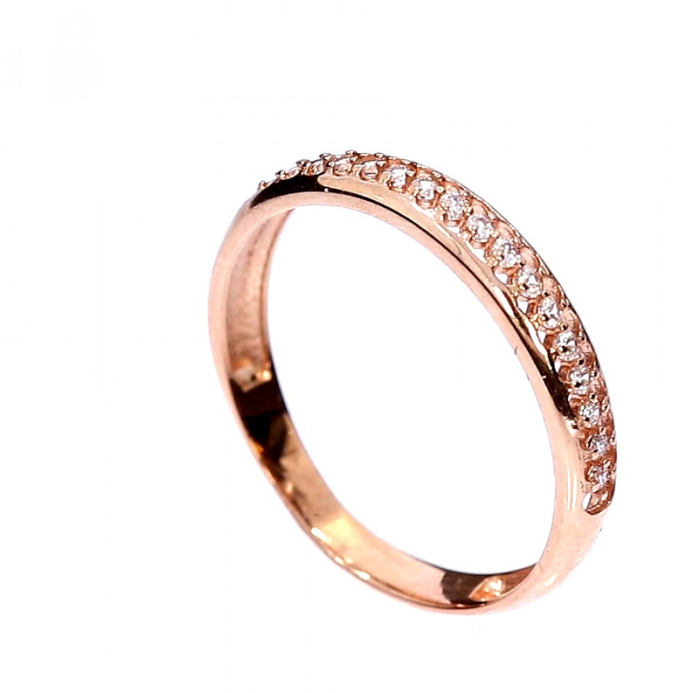 Golden ring with zircon