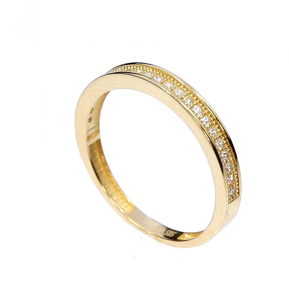 Golden ring with zircon