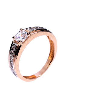Golden ring with zircon