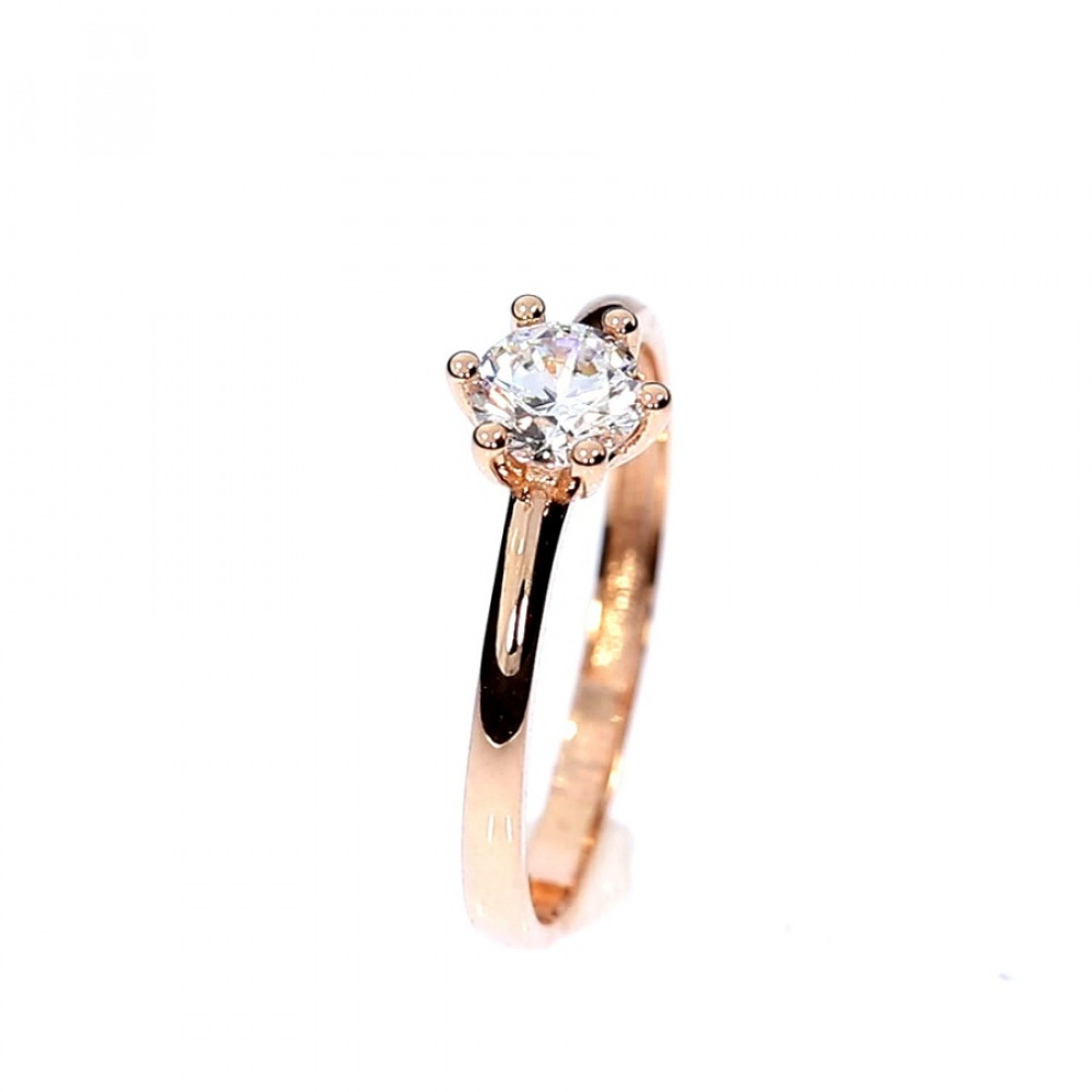 Golden ring with zircon
