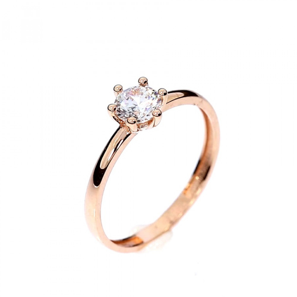 Golden ring with zircon