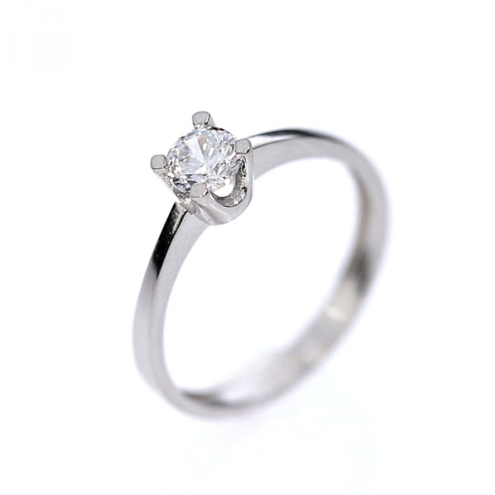 Golden ring with zircon