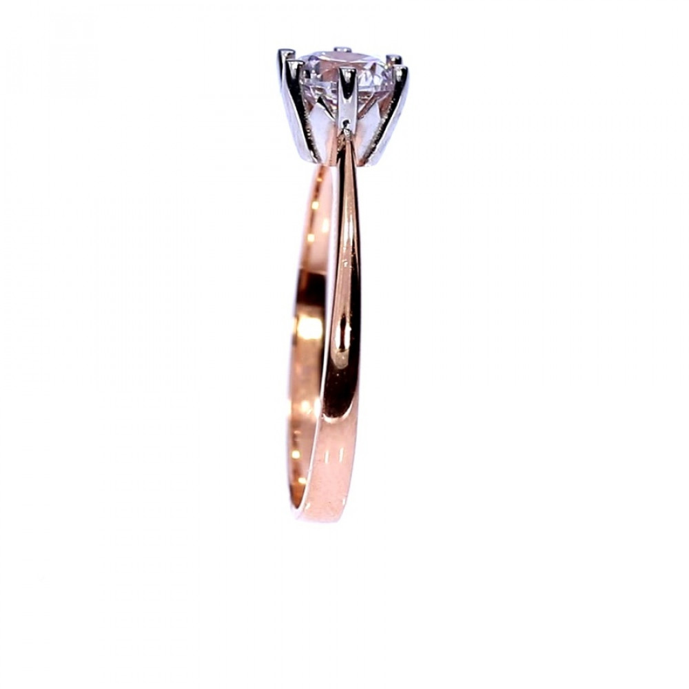 Golden ring with zircon