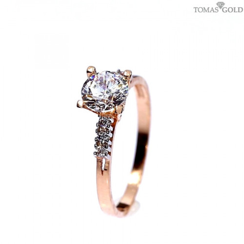 Golden ring with zircon