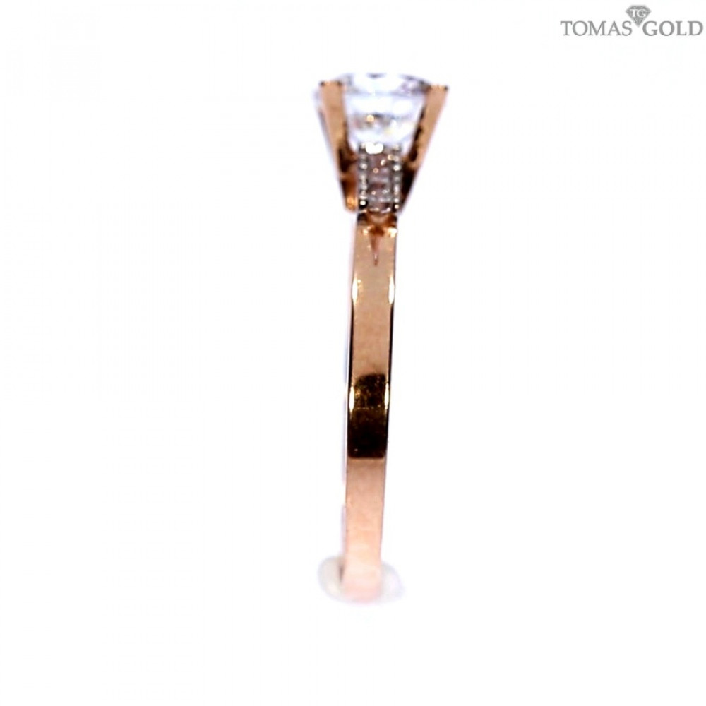 Golden ring with zircon