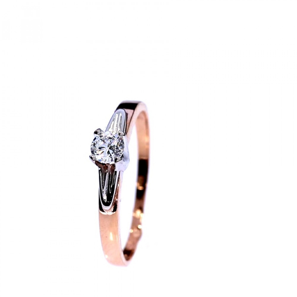 Golden ring with zircon