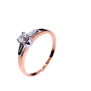 Golden ring with zircon