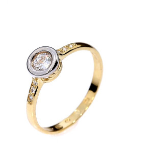 Golden ring with zircon
