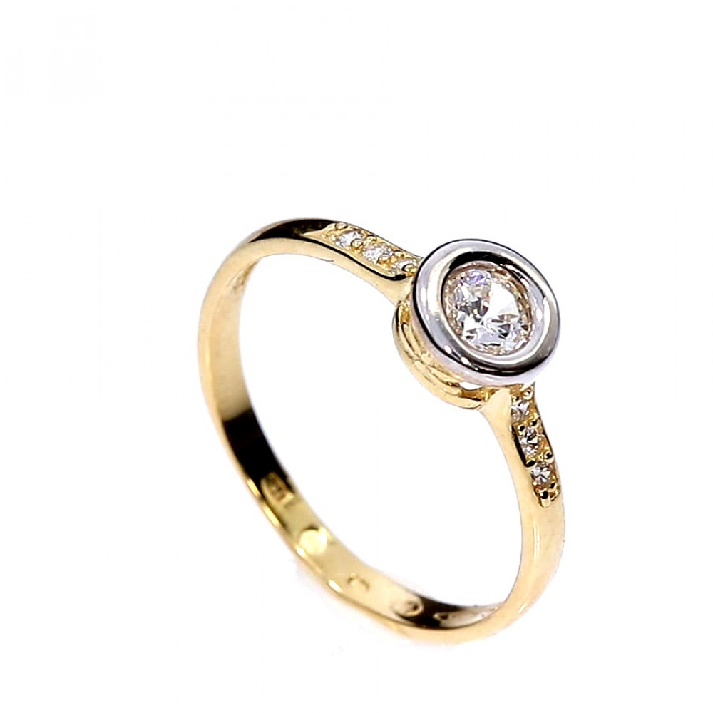 Golden ring with zircon