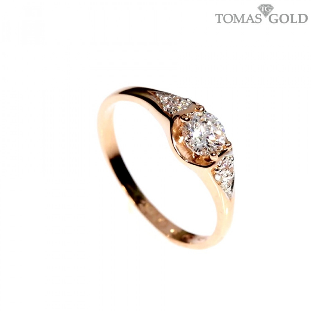 Golden ring with zircon