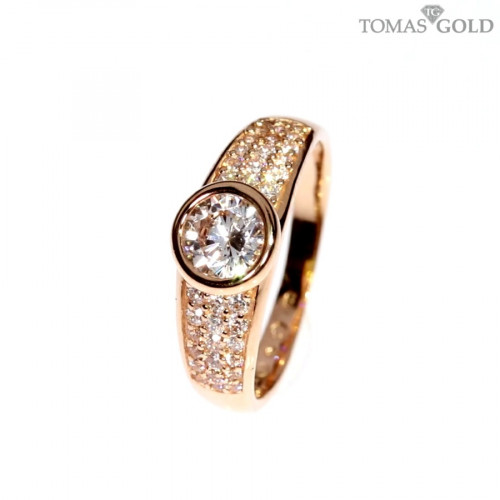 Golden ring with zircon