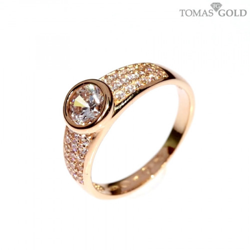 Golden ring with zircon
