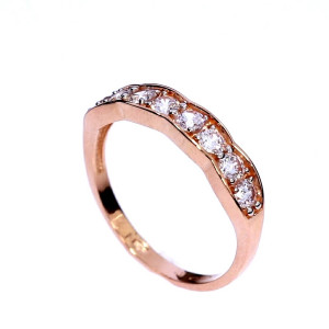 Golden ring with zircon