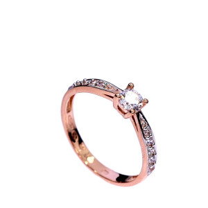 Golden ring with zircon