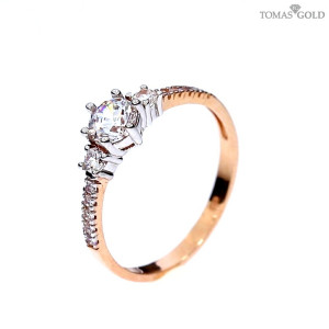 Golden ring with zircon