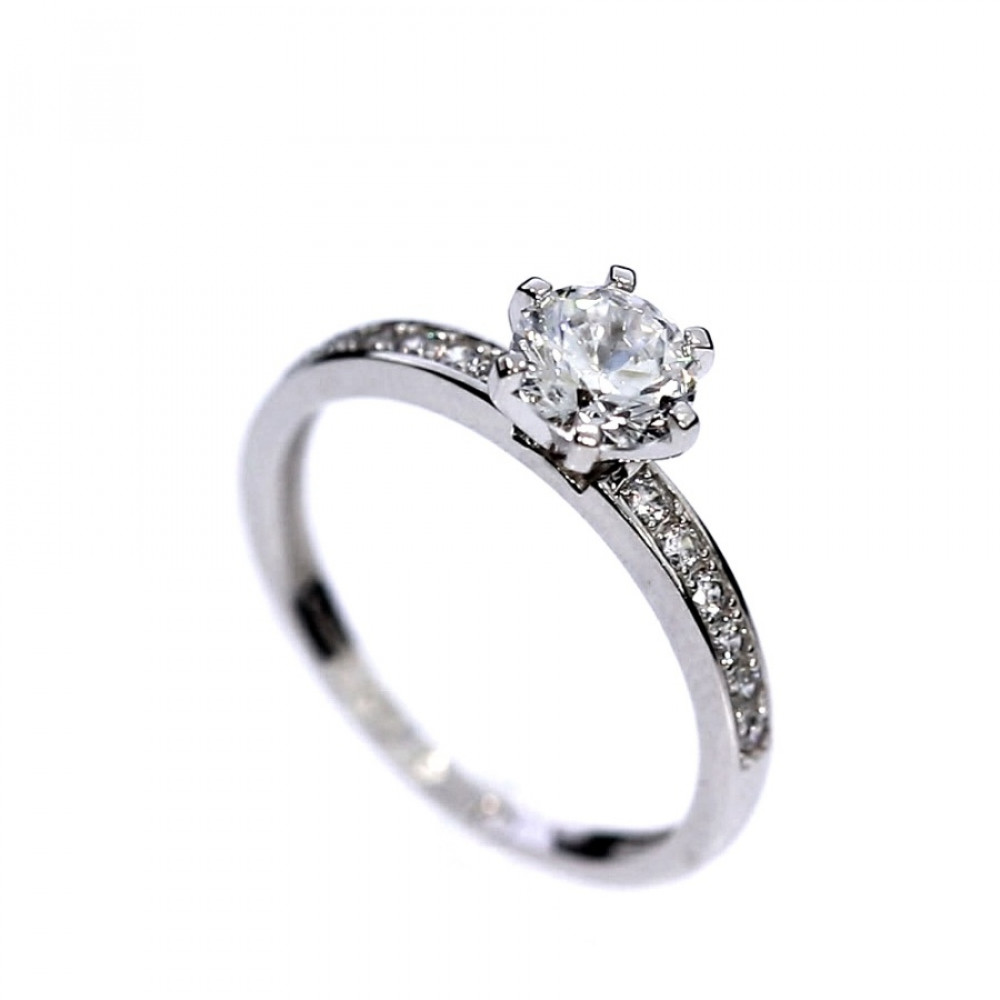 Golden ring with zircon