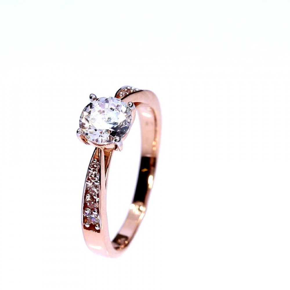 Golden ring with zircon