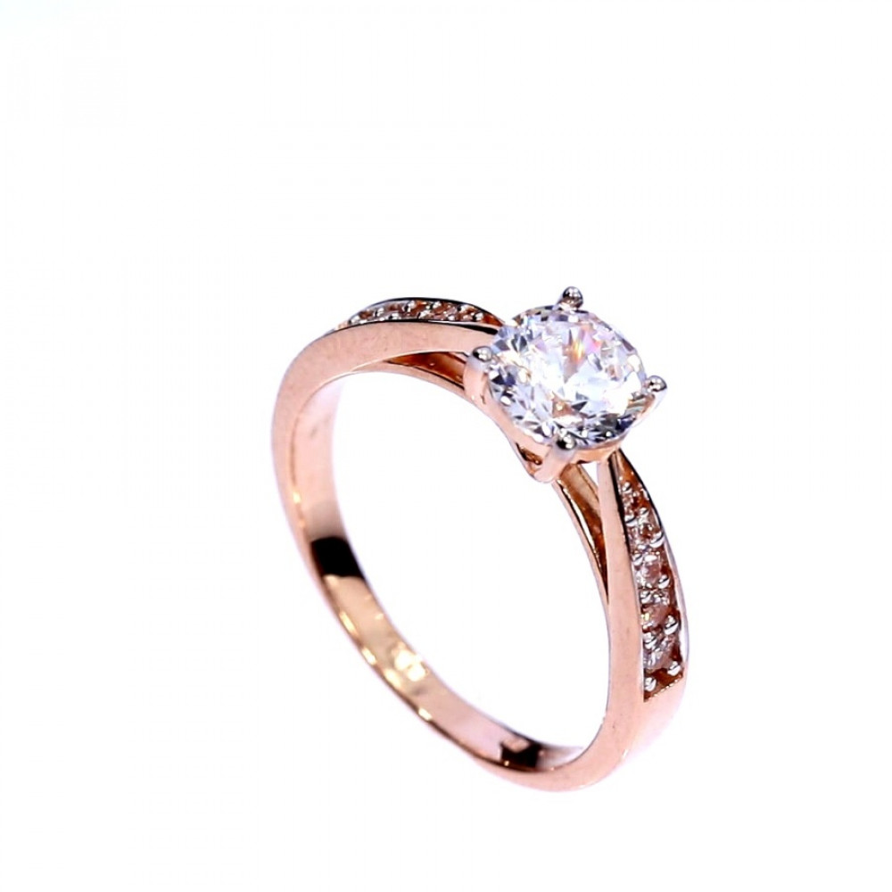 Golden ring with zircon