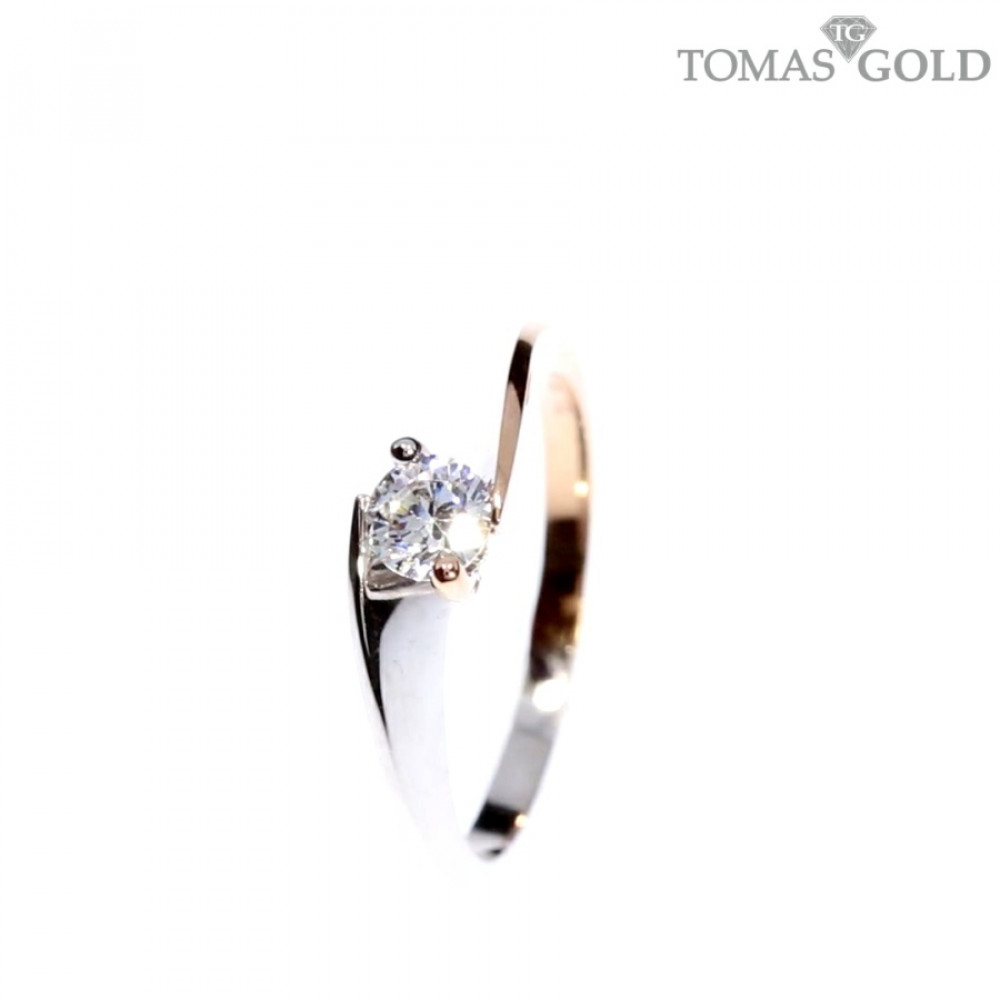 Golden ring with zircon