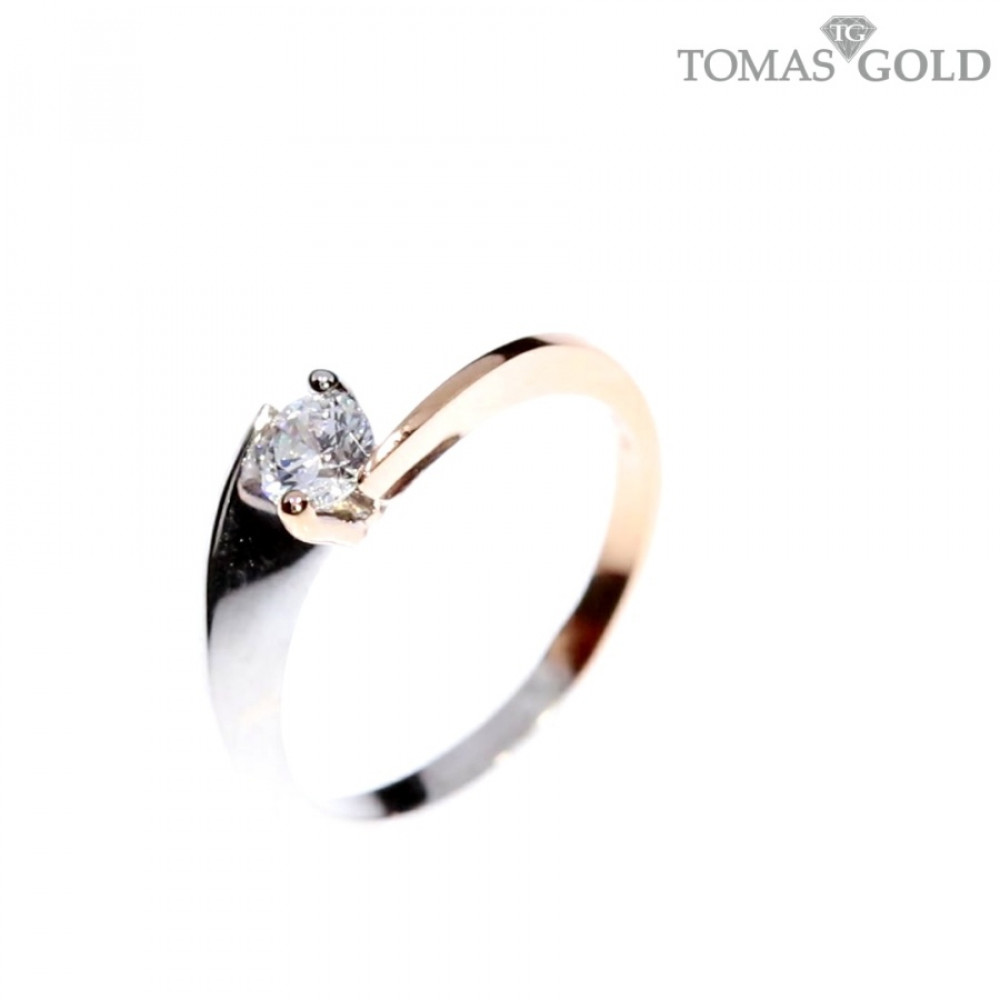 Golden ring with zircon