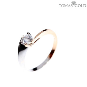 Golden ring with zircon