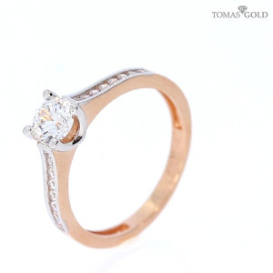 Golden ring with zircon