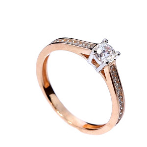 Golden ring with zircon