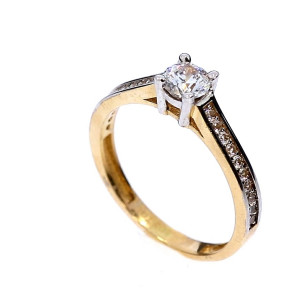 Golden ring with zircon