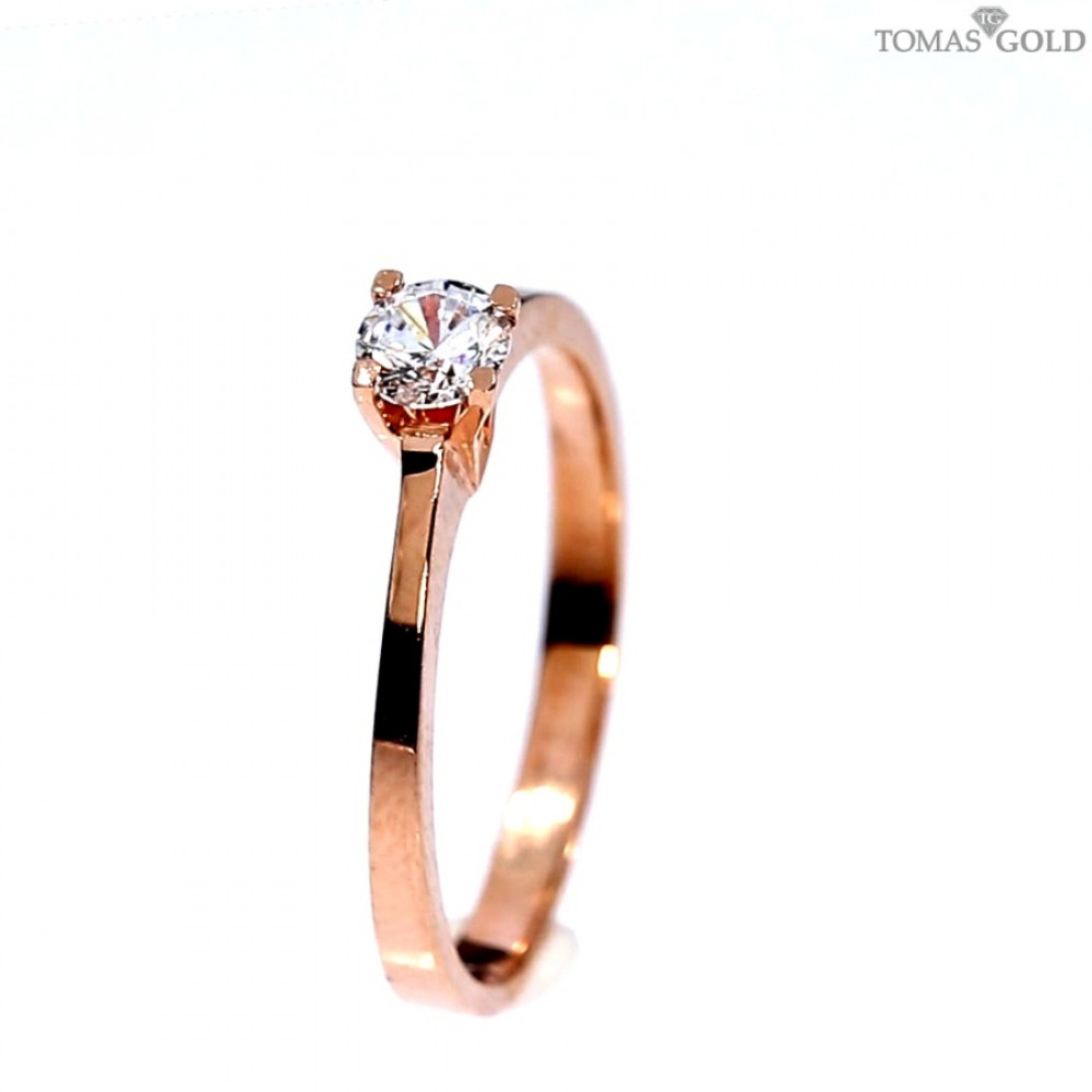 Golden ring with zircon