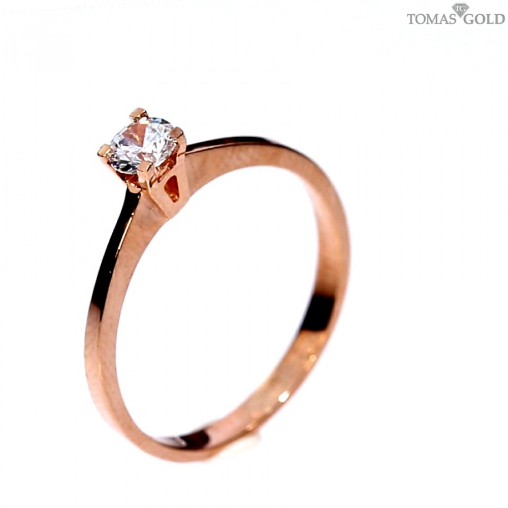 Golden ring with zircon