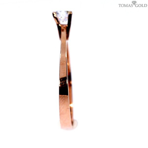 Golden ring with zircon