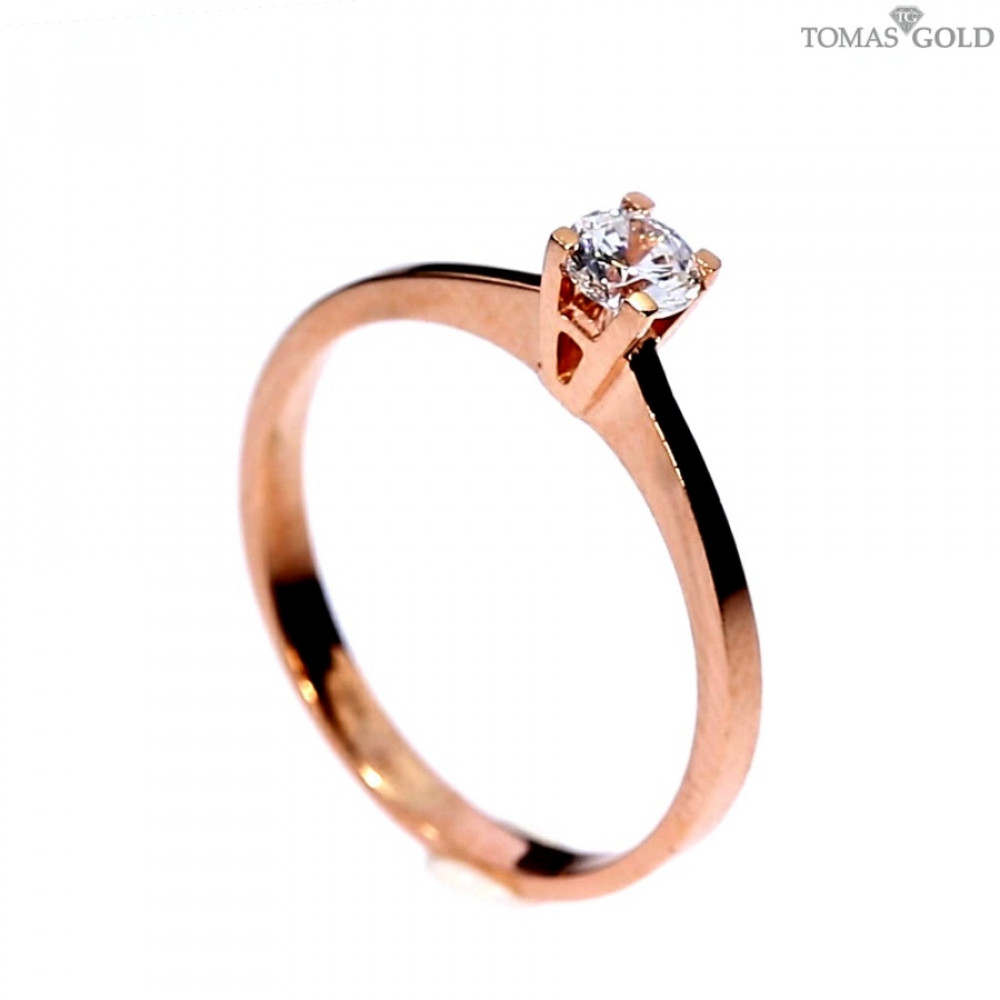 Golden ring with zircon