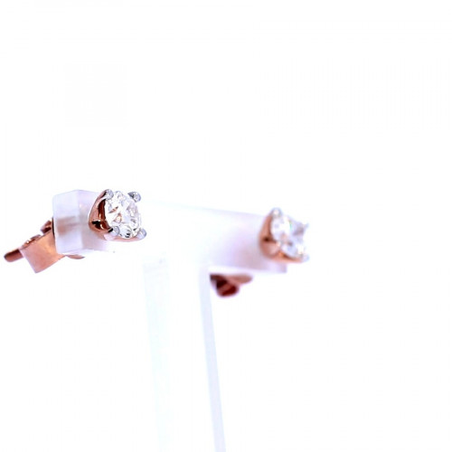 Golden earrings with precious stones