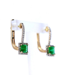 Gold earrings with emerald