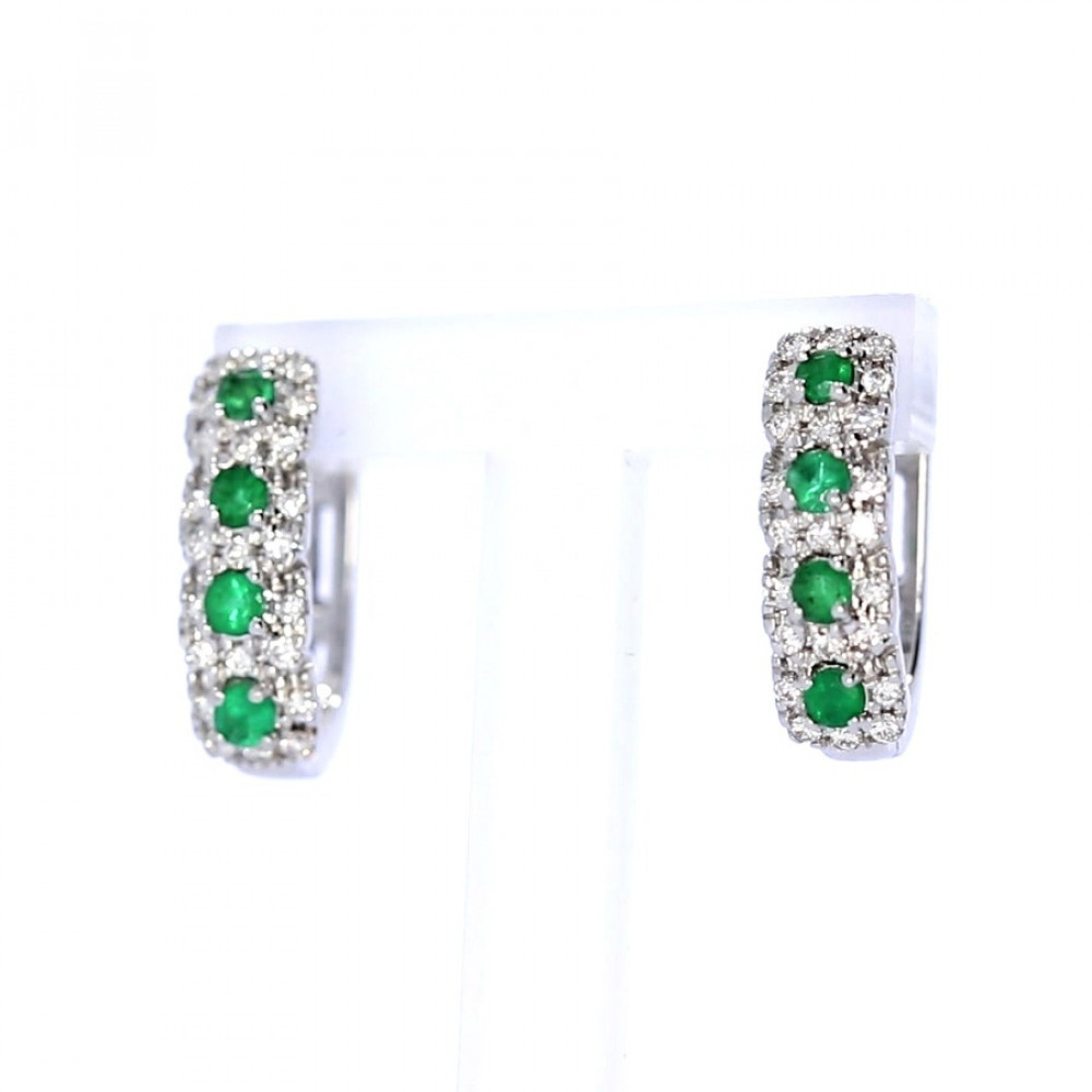 Gold earrings with emerald