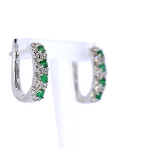 Gold earrings with emerald