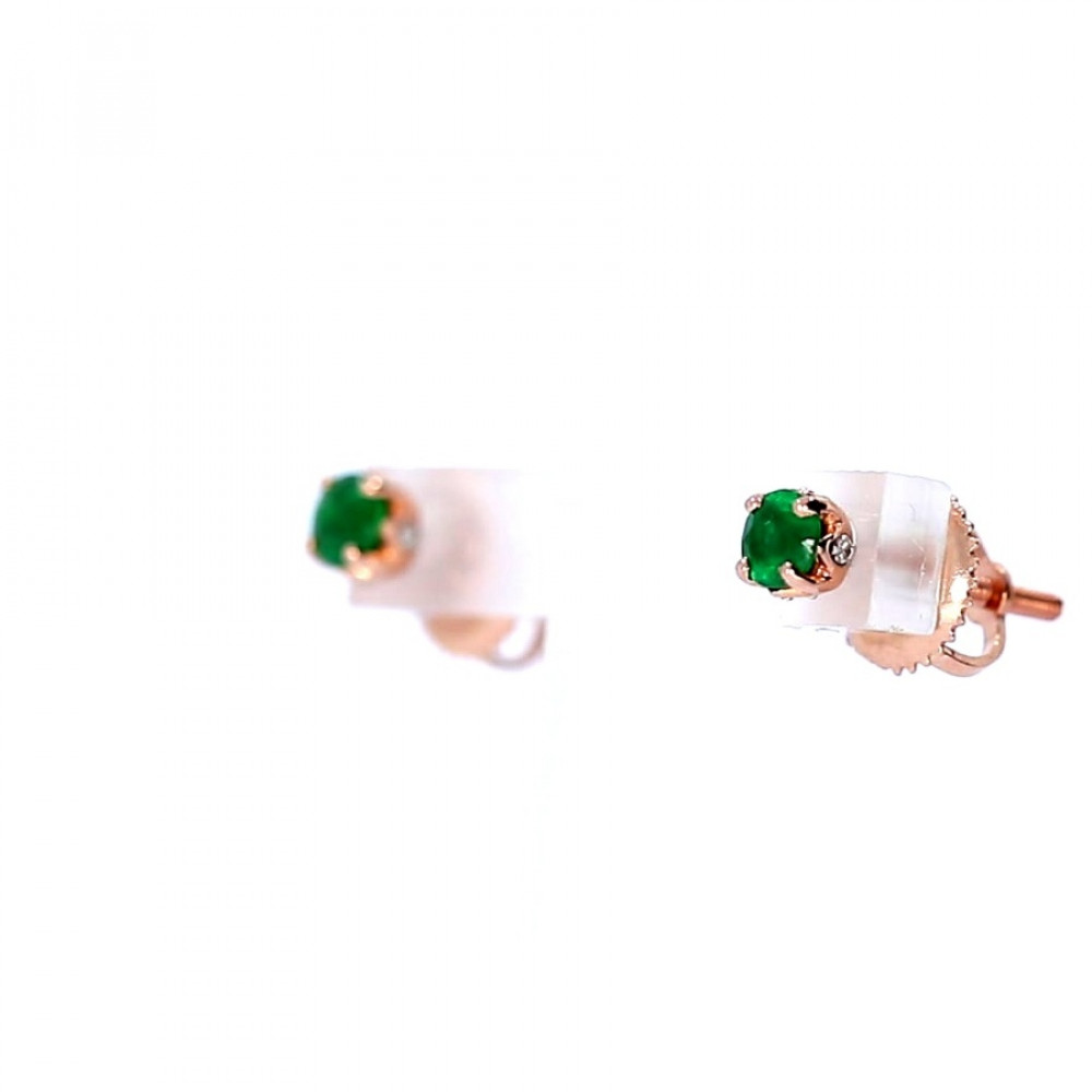 Gold earrings with emerald