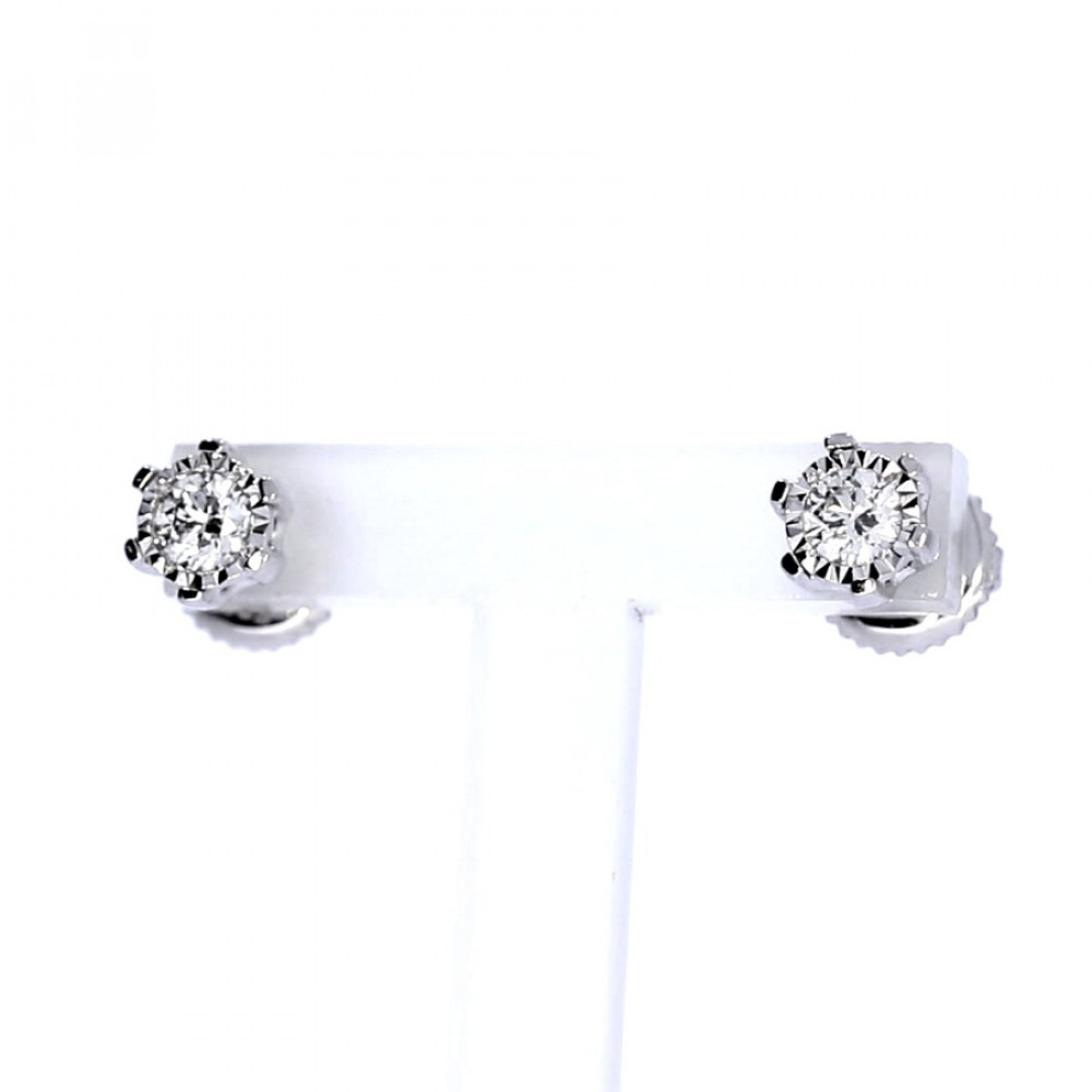 Golden earrings with precious stones