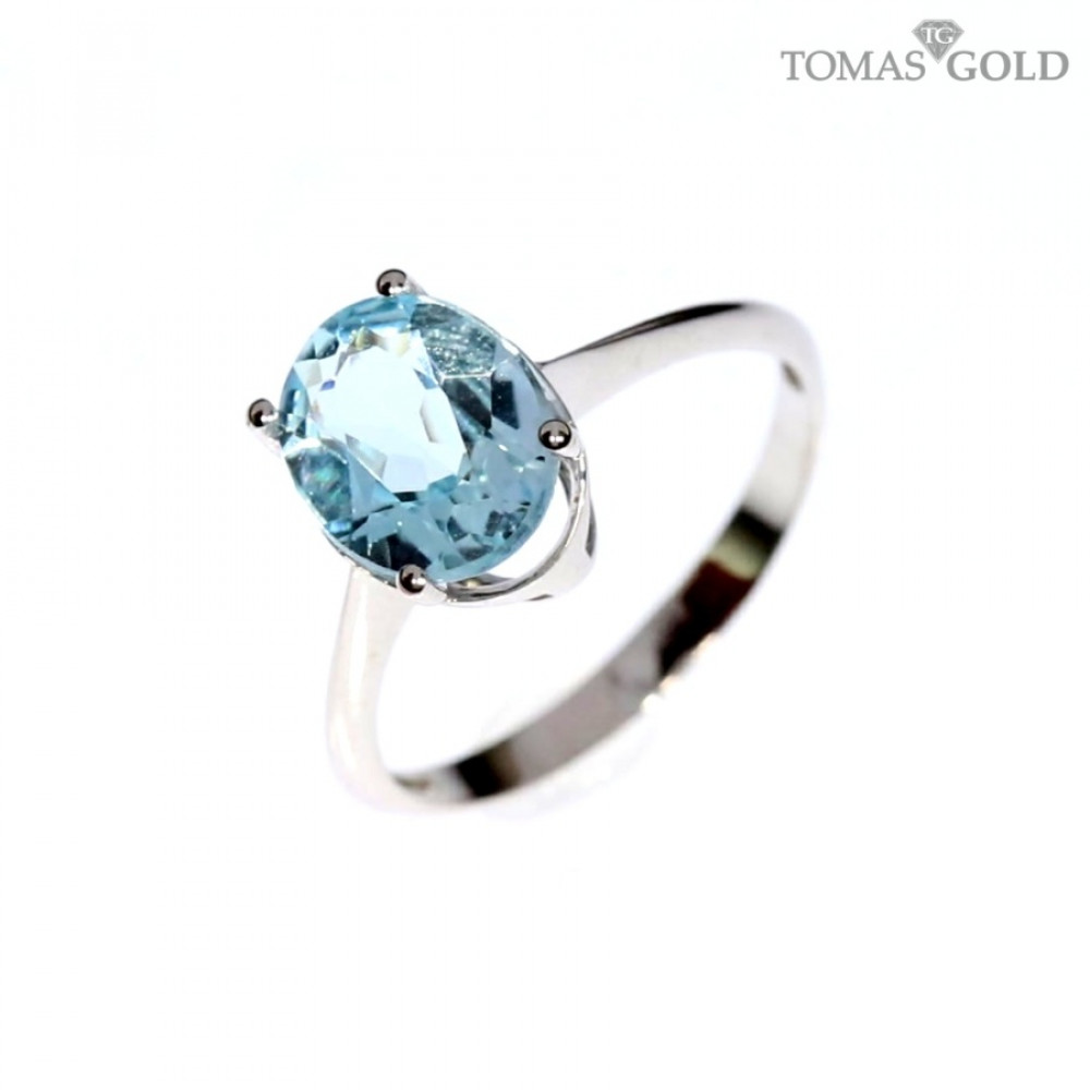 Gold ring with topaz