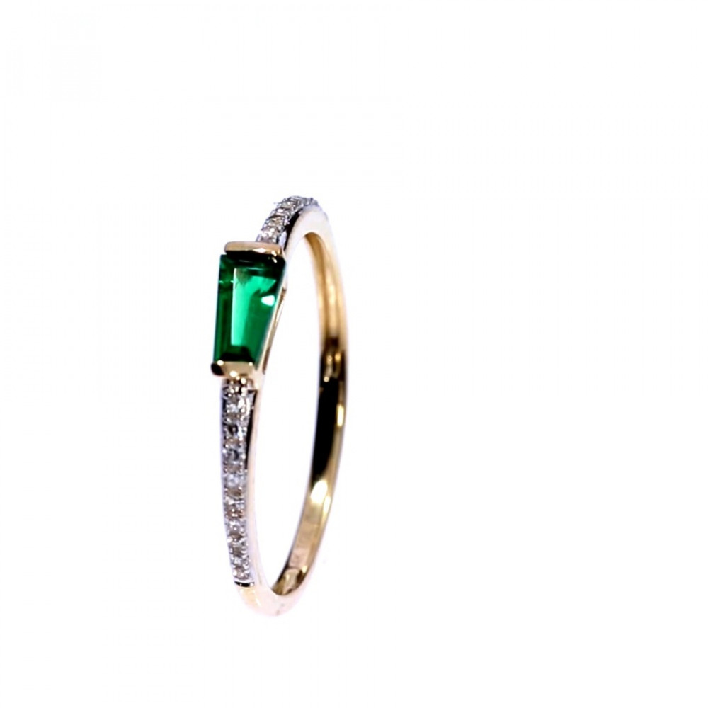 Gold ring with emerald