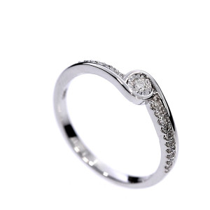 Golden ring with precious stones