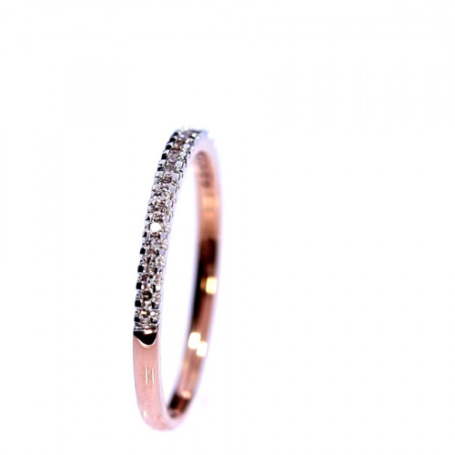 Golden ring with precious stones