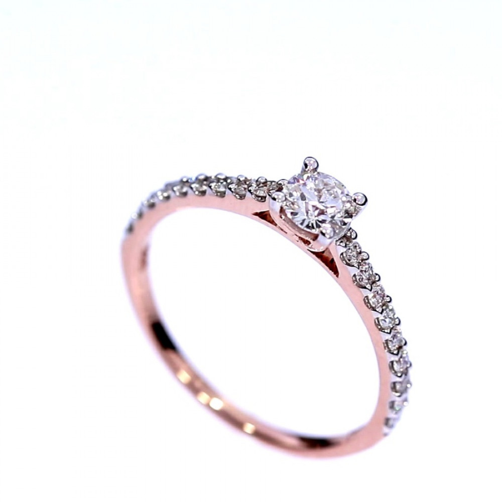 Golden ring with precious stones