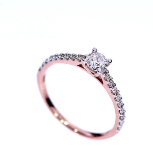 Golden ring with precious stones