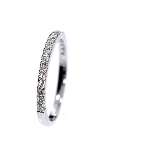 Golden ring with precious stones