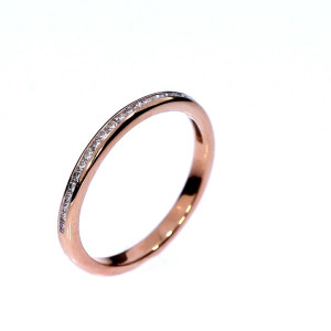 Golden ring with precious stones